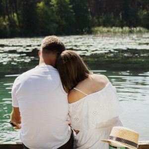 hugging-couple-wearing-white-clothes-from-shot