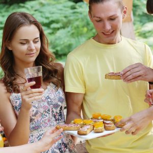 Outdoor, outside. People on the picnic